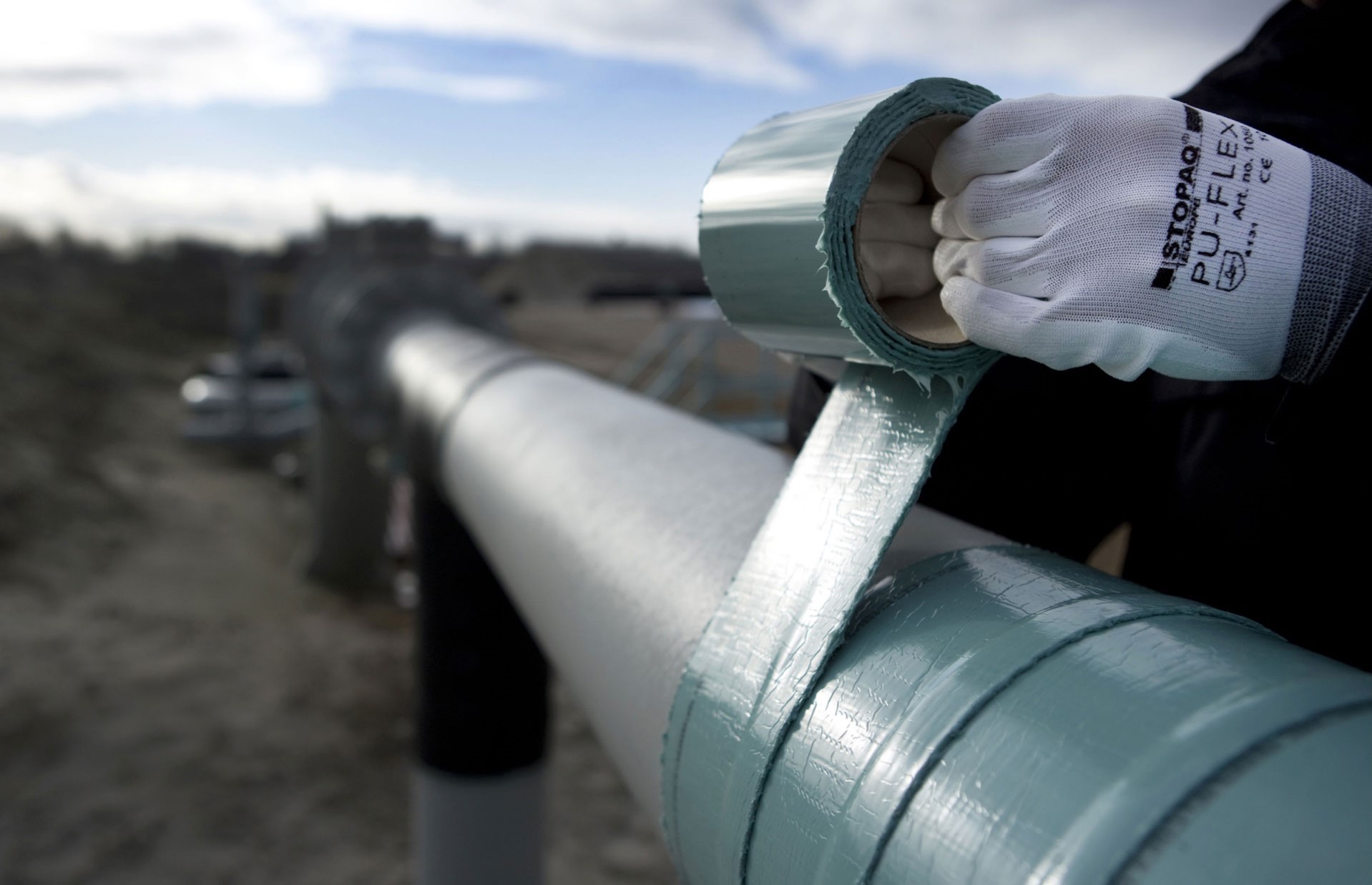 Pipe Wall Thickness Monitoring Under a Permanent Corrosion Prevention Coating